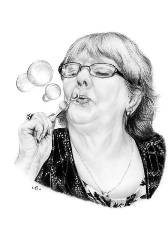 Female portrait blowing bubbles, graphite drawing